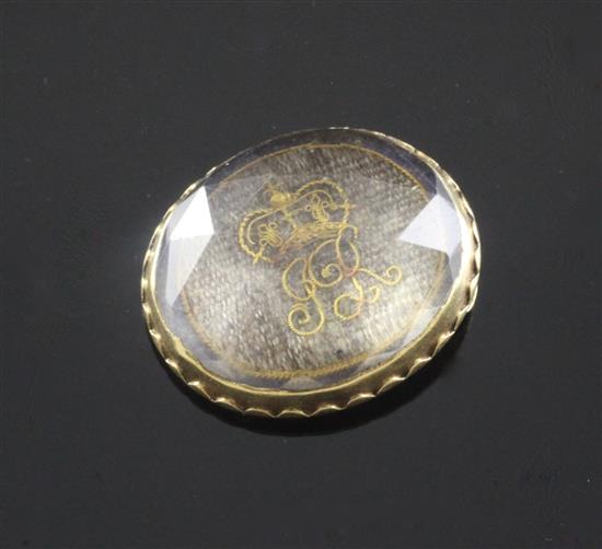 An early 18th century gold mounted Stuart crystal momento mori slide, 20mm.